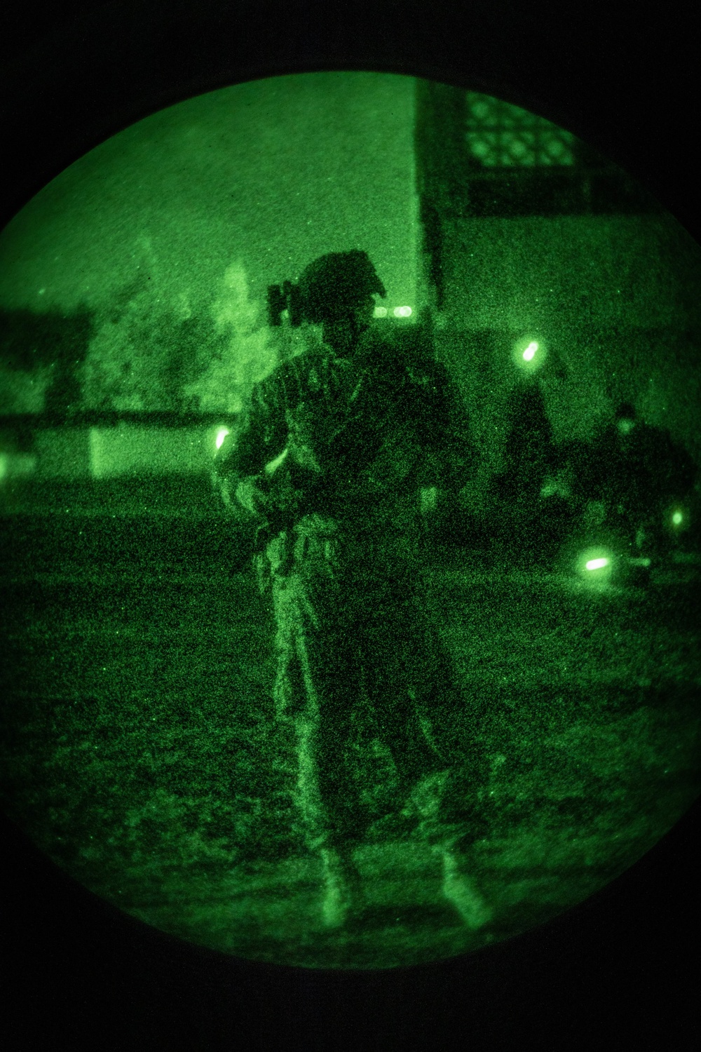 US Marines conduct a night range during the Marine Corps Marksmanship Competition Far East