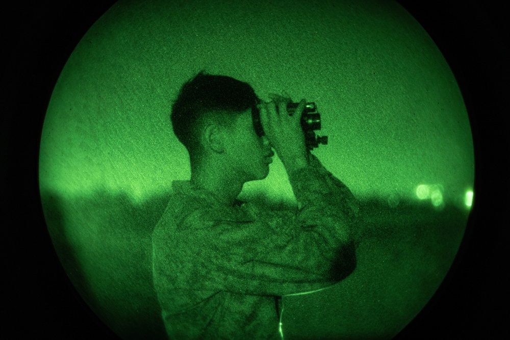 US Marines conduct a night range during the Marine Corps Marksmanship Competition Far East