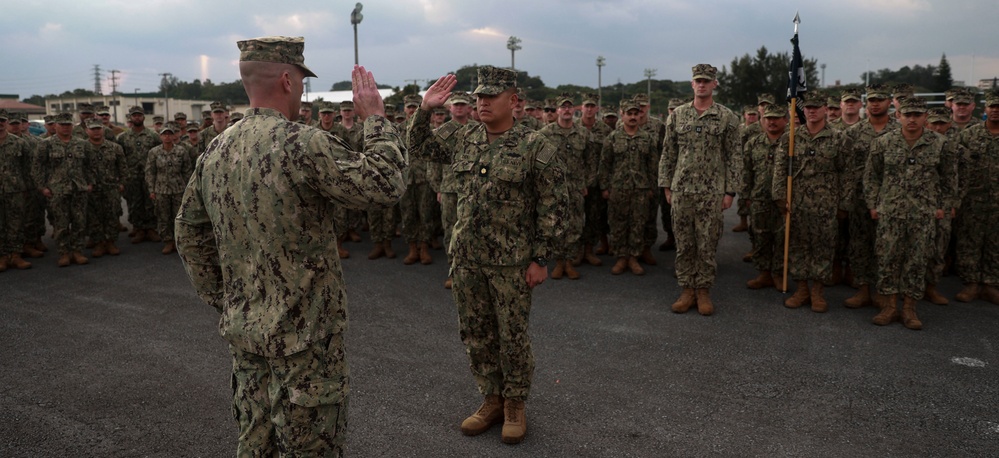 Promotion of Lt. Commander Chen to the rank of Commander.