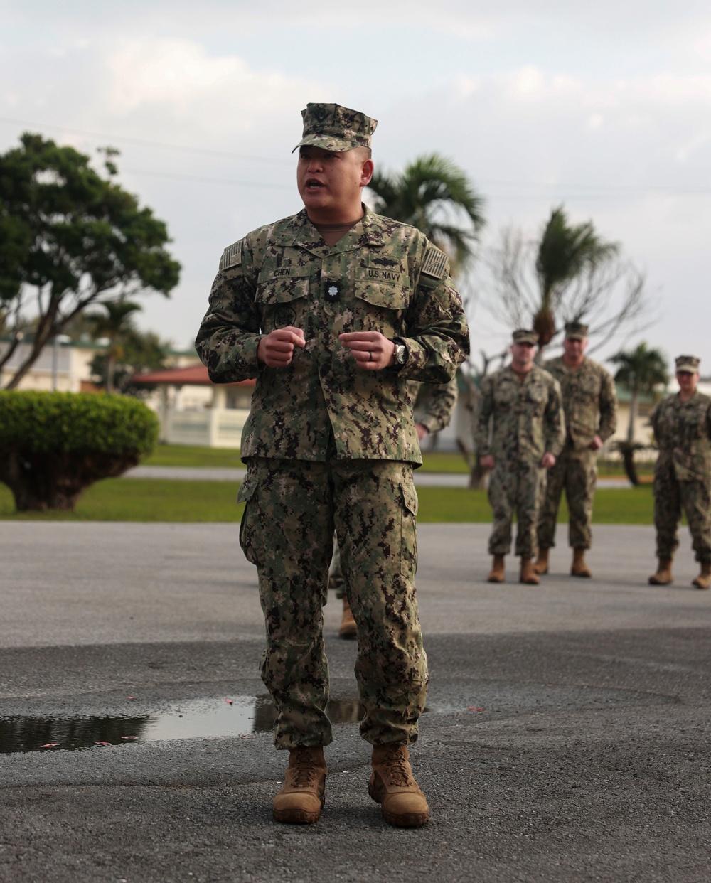 Promotion of Lt. Commander Chen to the rank of Commander.