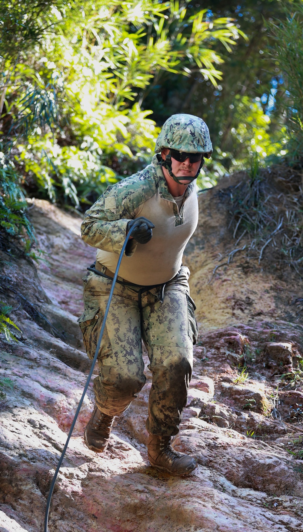 Equipment Operator 3rd Class Cody Tilly, repels down hasty during the E-course