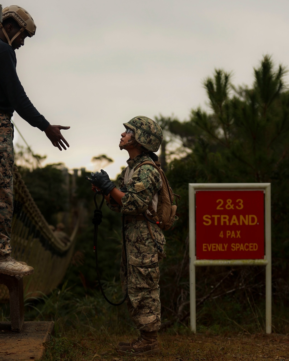 Engineering Aid 3rd Class Chelsea Nena of Naval Mobile Construction Battalion Four.