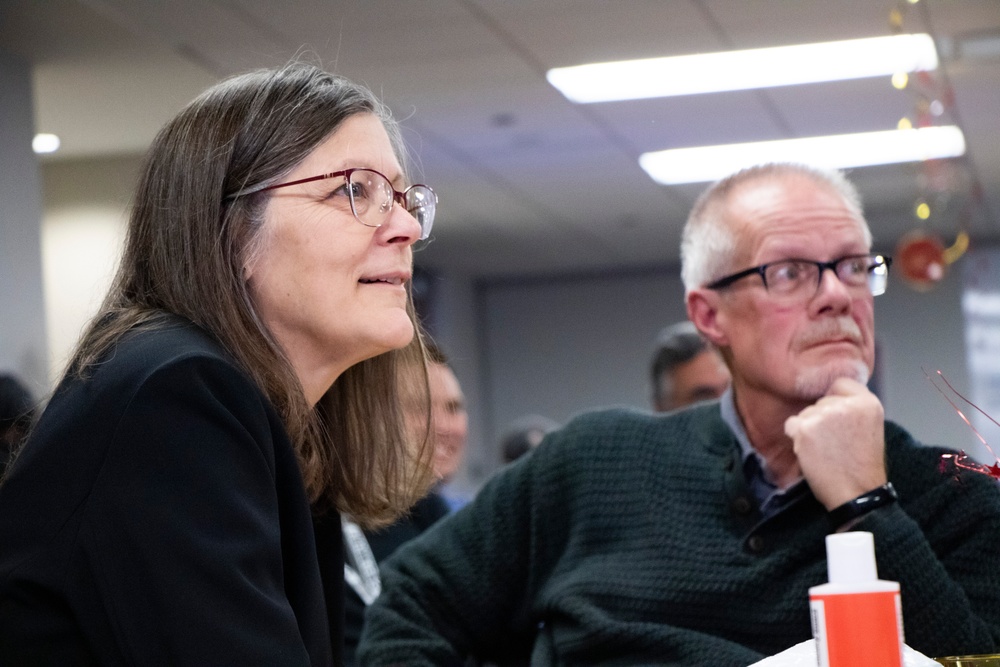 Susanne Davis and Husband Kent Davis attend her retirement ceremony. December 1, 2022