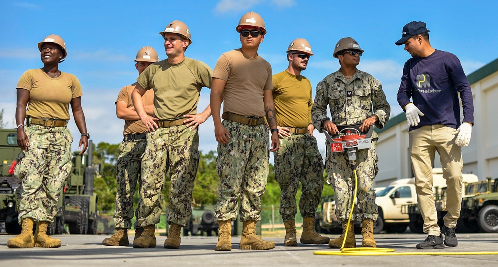 Seabees with Naval Mobile Construction Battalion Four attend hands-on training courses on Camp Shields.