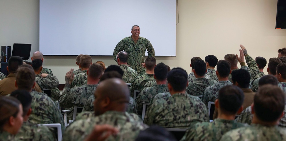 Naval Construction Group One Commodore Meno Visits Naval Mobile Construction Battalion Four in Okinawa.