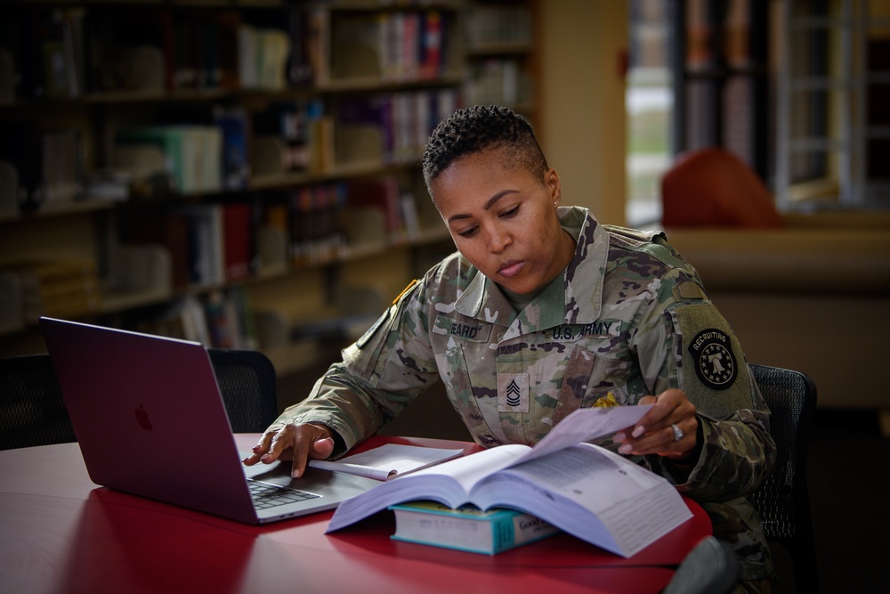 USAREC Soldier and Civilians at their local library