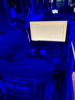 Seaman Gonzales prepares the New Year’s Eve log