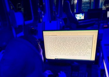 Seaman Gonzales prepares the New Year’s Eve log