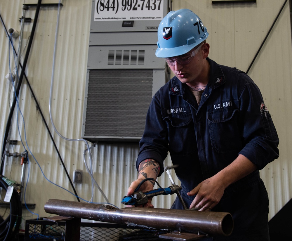 Sailors Serve Aboard USS Carl Vinson (CVN 70)