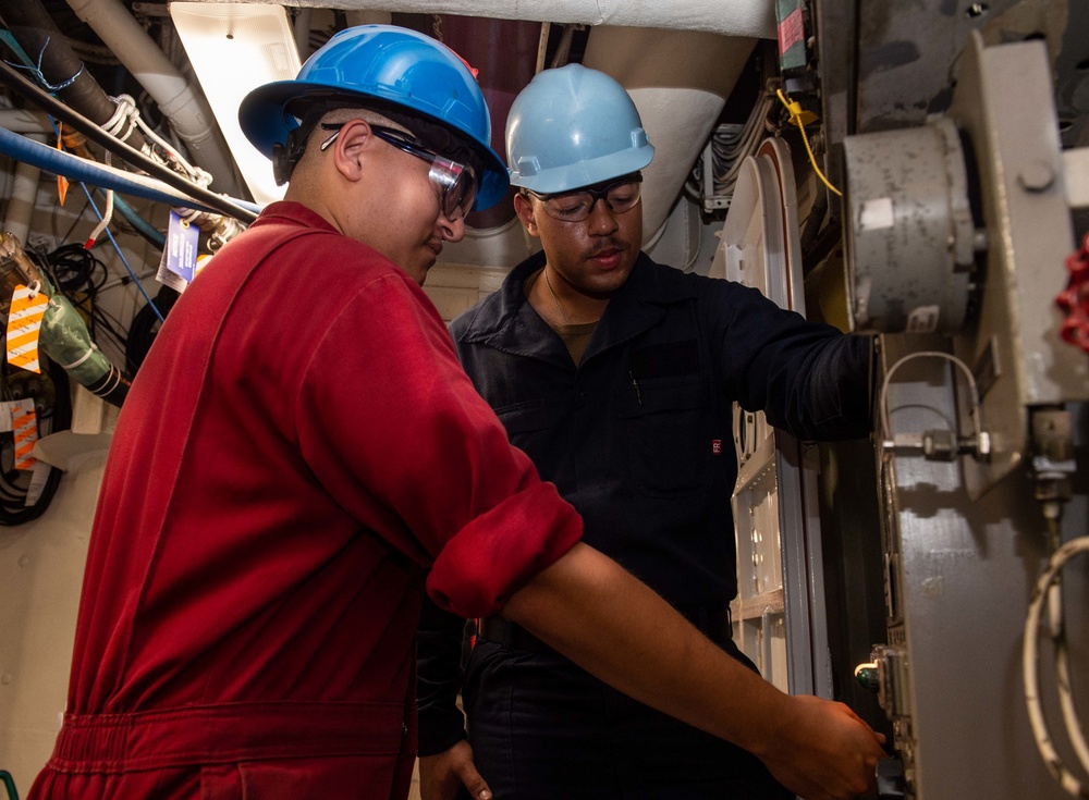 Sailors Serve Aboard USS Carl Vinson (CVN 70)