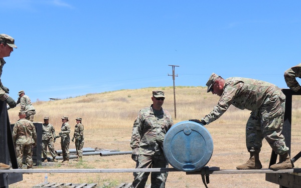 63rd Readiness Division Soldiers complete leadership reaction course during annual training