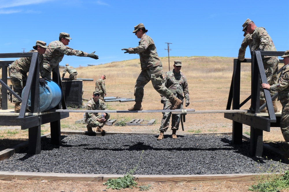 63rd Readiness Division Soldiers complete leadership reaction course during annual training