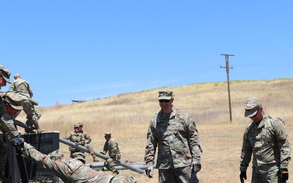 63rd Readiness Division Soldiers complete leadership reaction course during annual training