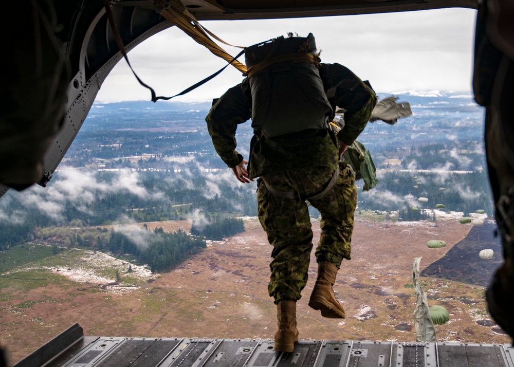 Drop zone drop-off: Washington National Guard pilots support special forces static line jumps