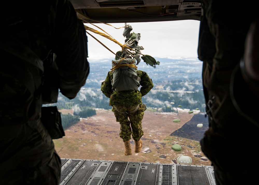 Drop zone drop-off: Washington National Guard pilots support special forces static line jumps