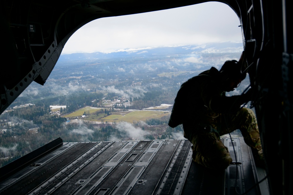 Drop zone drop-off: Washington National Guard pilots support special forces static line jumps