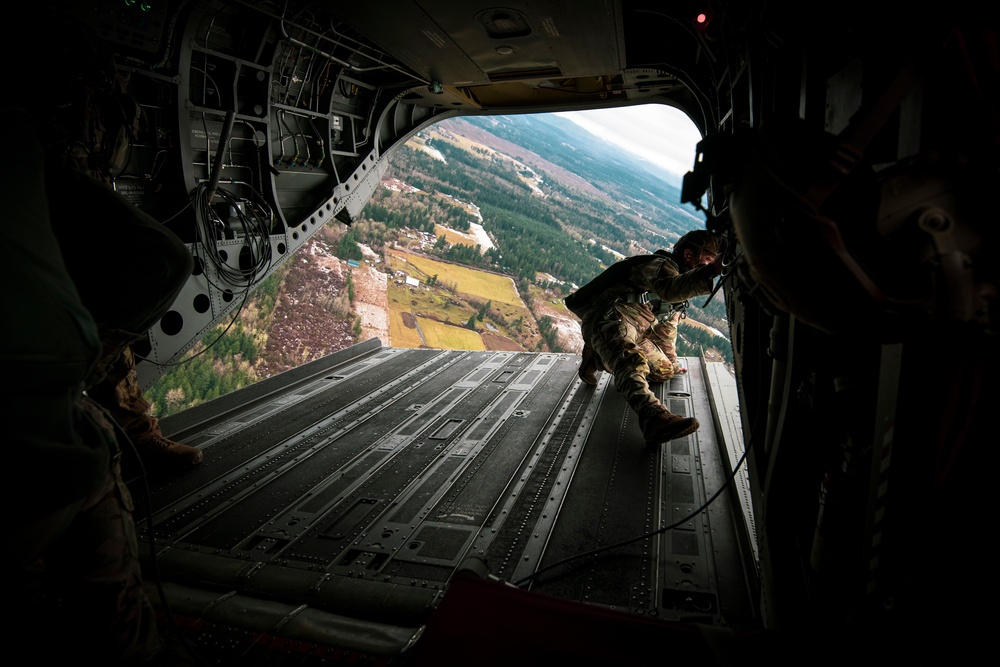 Drop zone drop-off: Washington National Guard pilots support special forces static line jumps