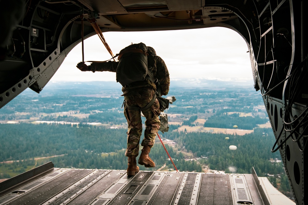 Drop zone drop-off: Washington National Guard pilots support special forces static line jumps