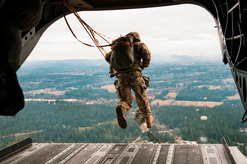 Drop zone drop-off: Washington National Guard pilots support special forces static line jumps