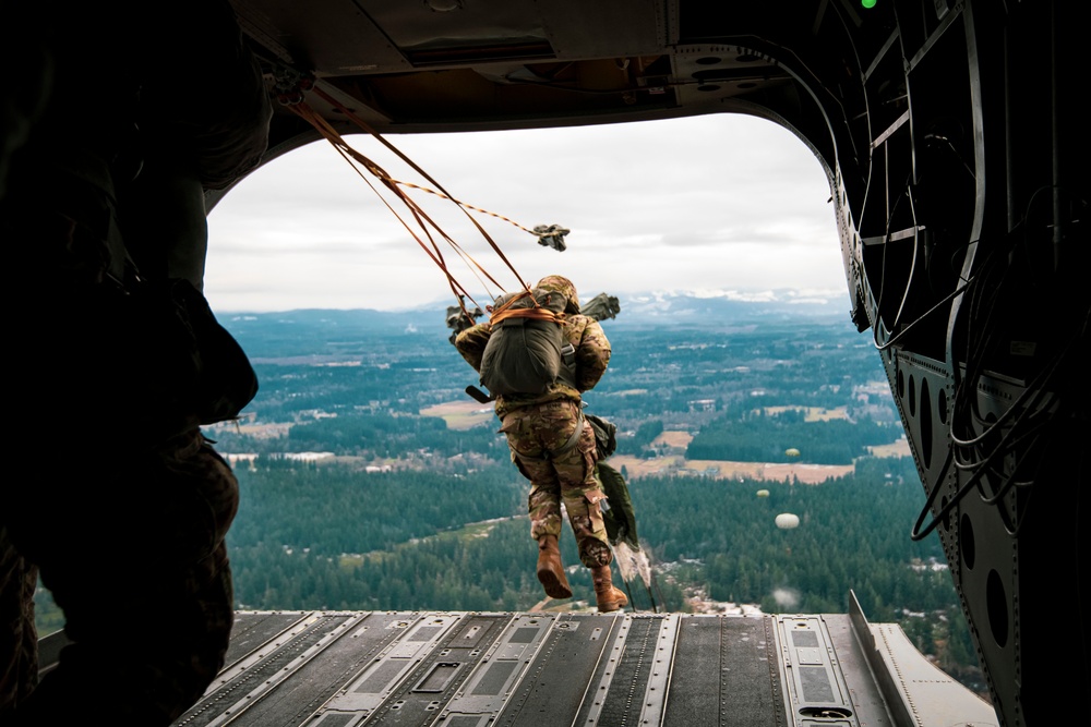 Drop zone drop-off: Washington National Guard pilots support special forces static line jumps