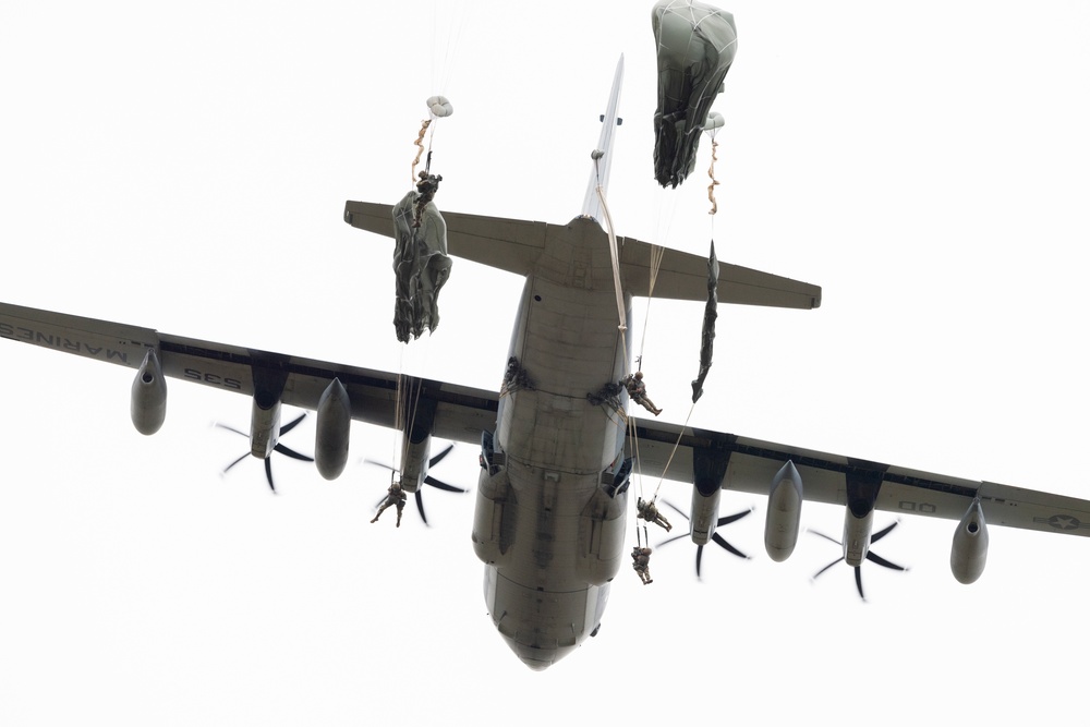 Army paratroopers and Marine Corps aviators conduct joint airborne operations at JBER