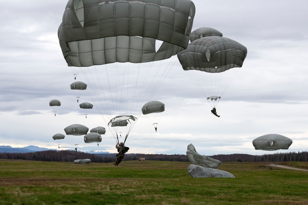 Army paratroopers and Marine Corps aviators conduct joint airborne operations at JBER