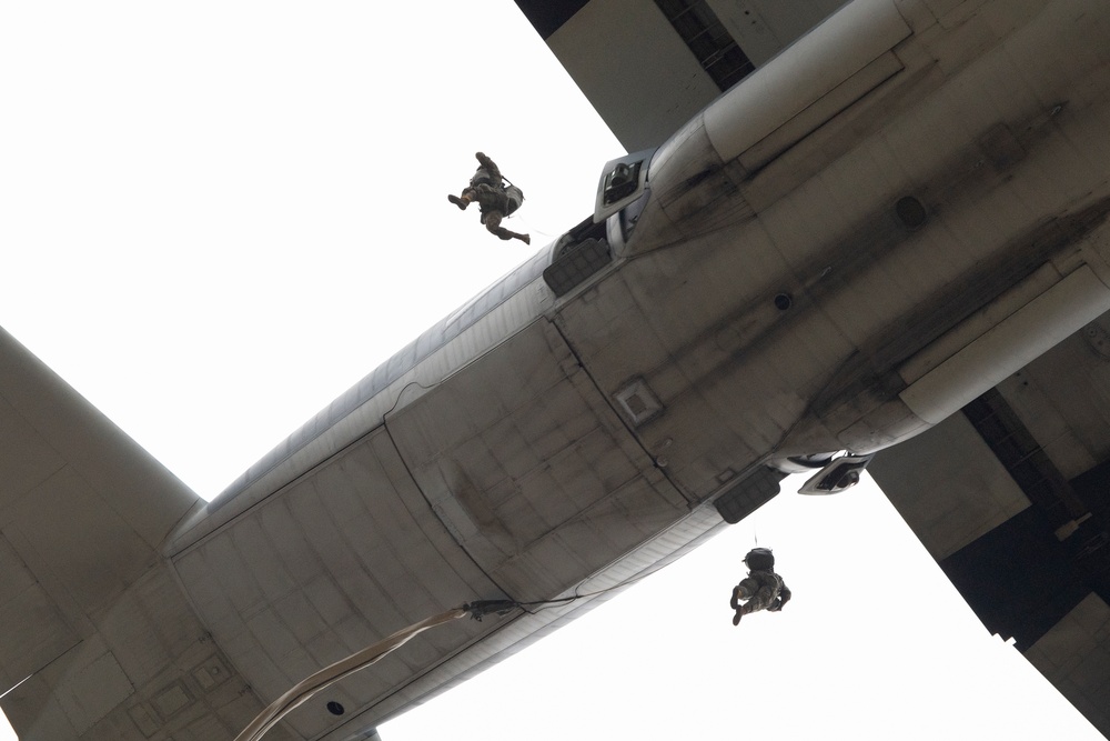 Army paratroopers and Marine Corps aviators conduct joint airborne operations at JBER