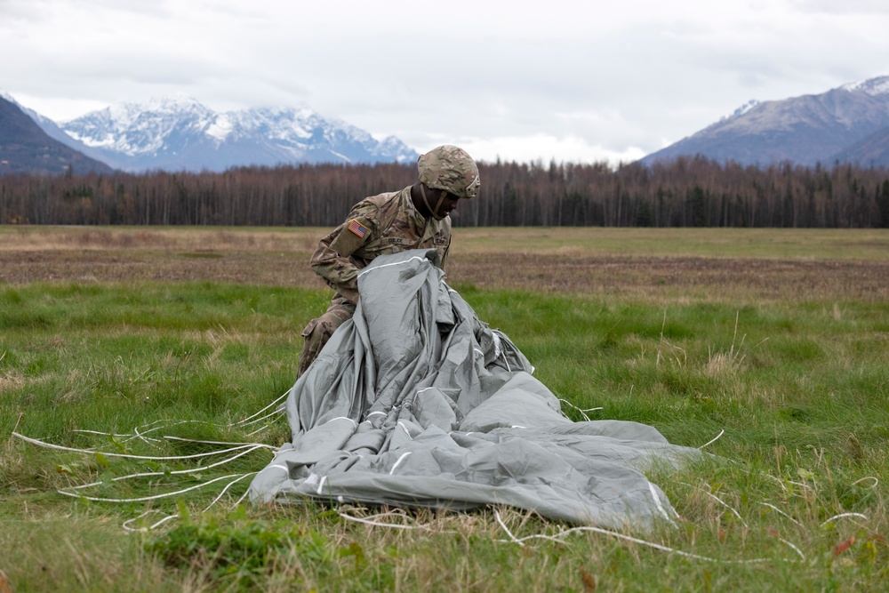 Army paratroopers and Marine Corps aviators conduct joint airborne operations at JBER