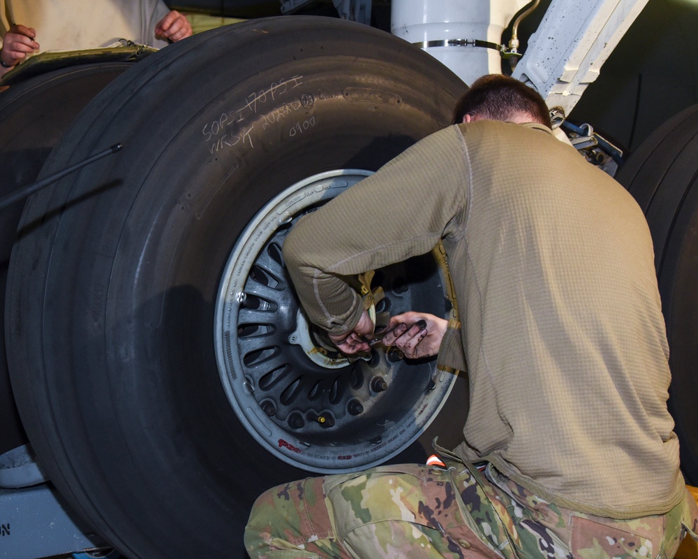 Airmen Perform Maintenance on Aircraft Brakes