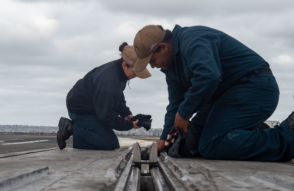 Sailors Serve Aboard USS Carl Vinson (CVN 70)