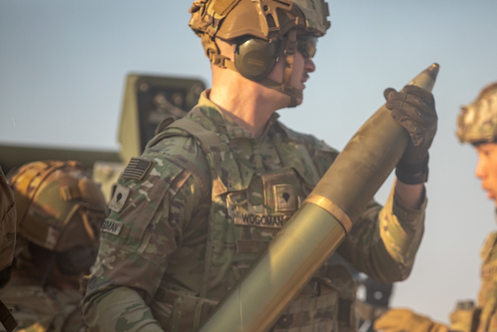 Bravo Battery, 1st Battalion, 134th Field Artillery Regiment, 37th Infantry Brigade Combat Team, Ohio Army National Guard Conduct an operational rehearsal exercise of the M119 Howitzer