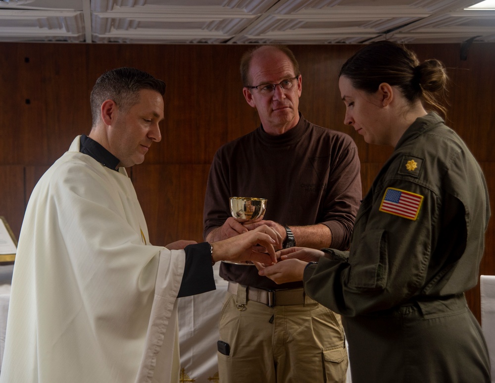 Sailors Offer Communion During Religious Service