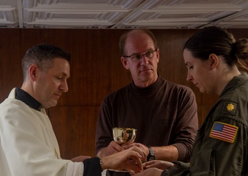 Sailors Offer Communion During Religious Service