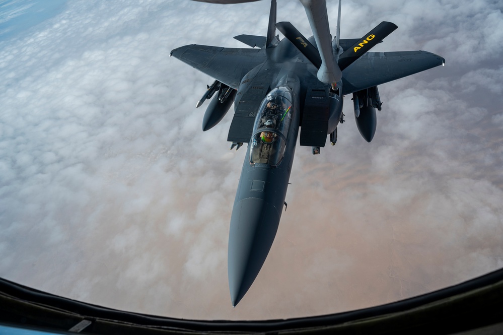 F-15s fly high with KC-135