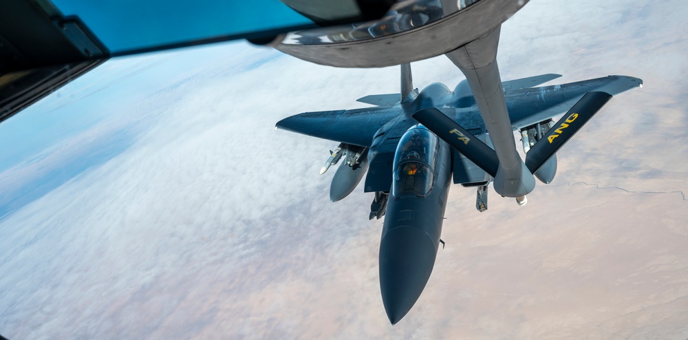 F-15s fly high with KC-135