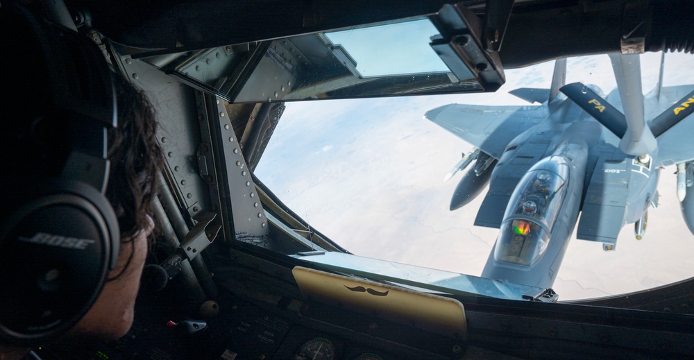 F-15s fly high with KC-135