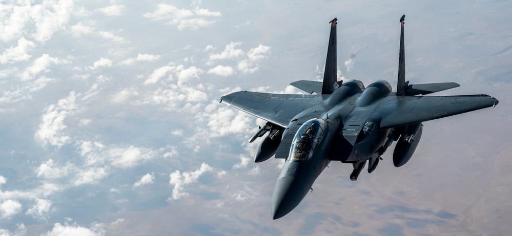 F-15s fly high with KC-135