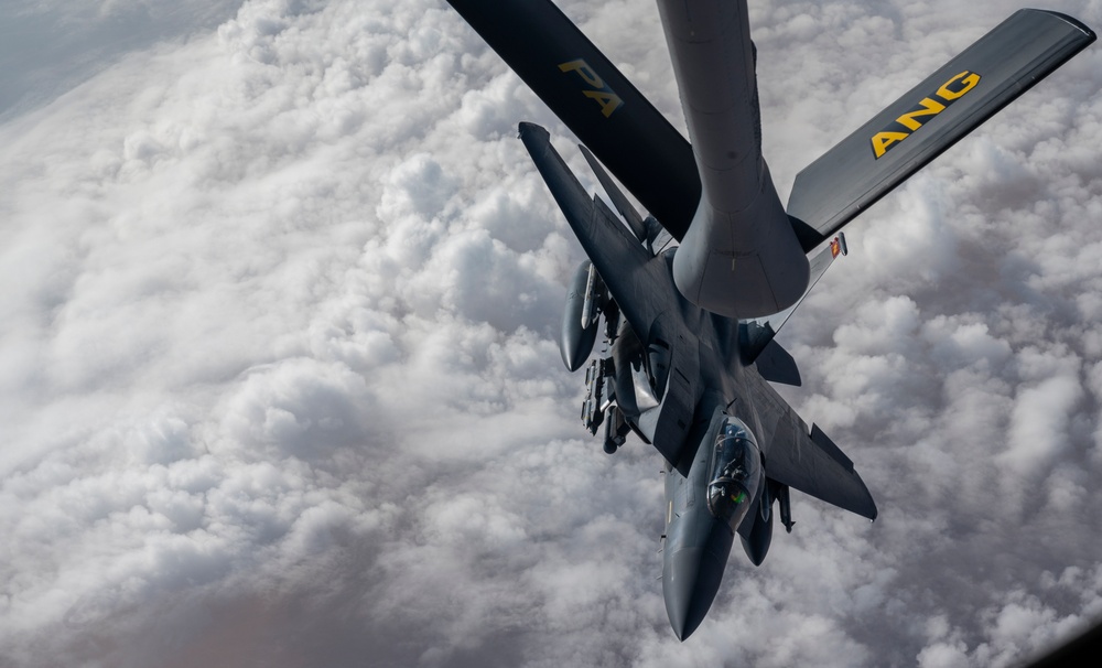 F-15s fly high with KC-135