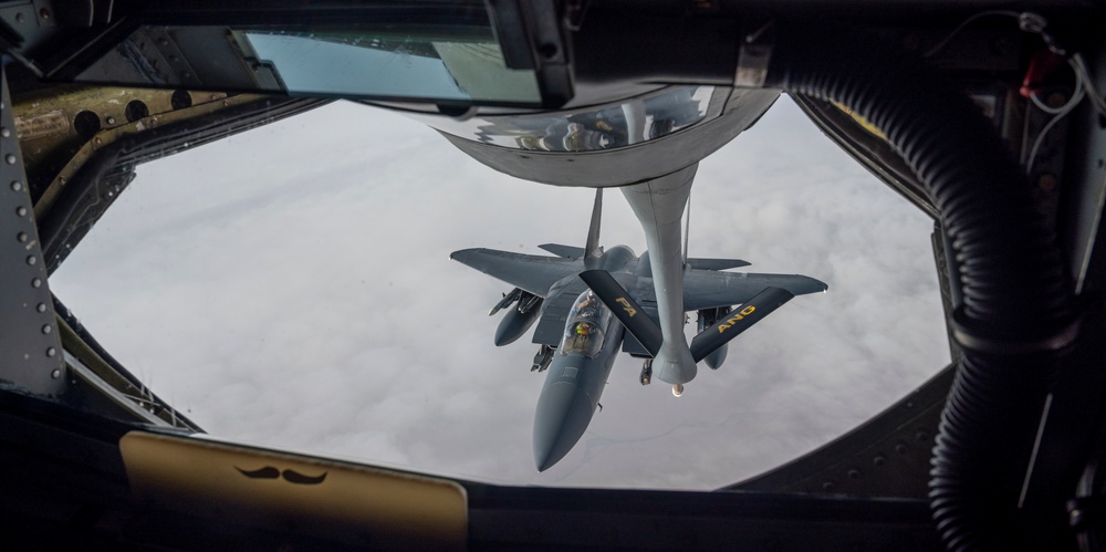 F-15s fly high with KC-135