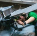 Sailor Performs Maintenance on Helicopter Blade