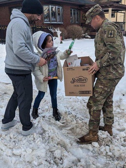New York National Guard MPs pass out post-Christmas Cheer.
