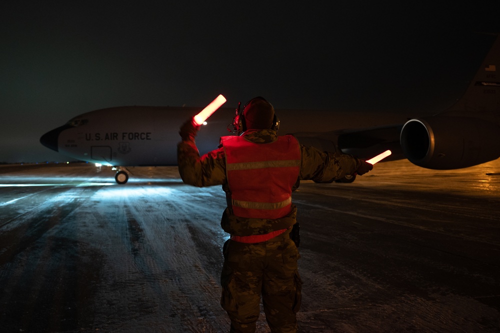 Marshalling KC-135 Stratotanker for takeoff