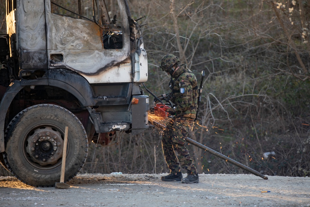 KFOR conducts roadblock removal in Mitrovica