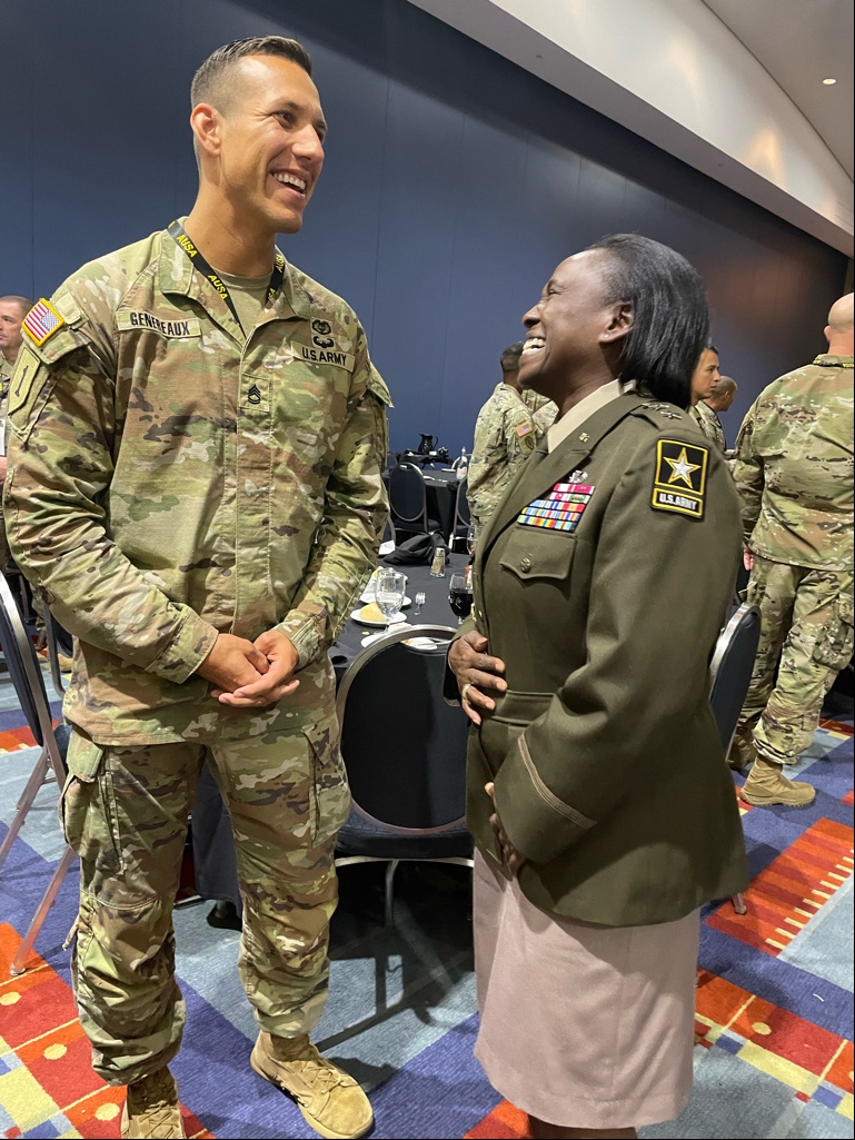 Maj. Gen. (P) Telita Crosland chats with a Soldier