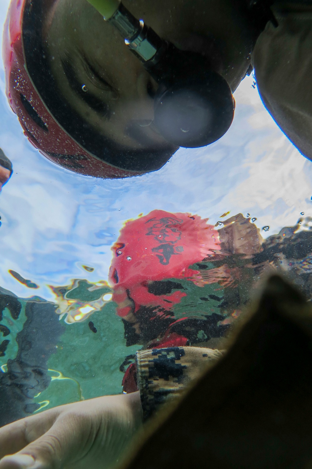 Combat Logistics Battalion 15 Performs Under Water Egress Training