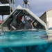Combat Logistics Battalion 15 Performs Under Water Egress Training