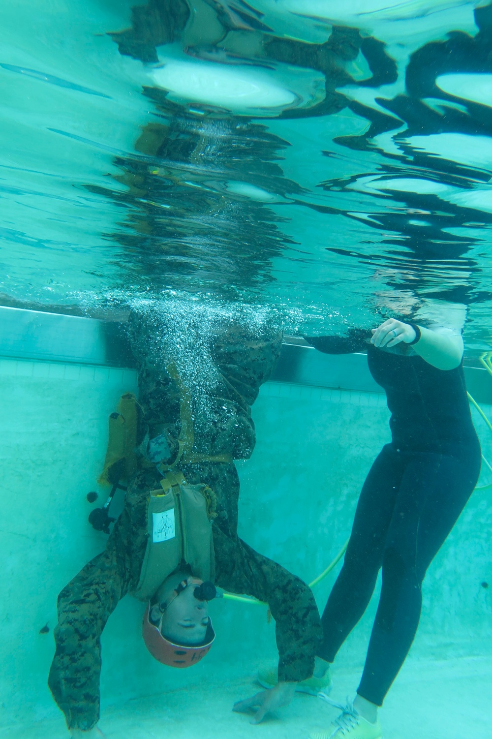 Combat Logistics Battalion 15 Performs Under Water Egress Training