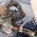 Charlie Company, 304th Expeditionary Signal Battalion soldiers assembling and maintaining signal equipment.