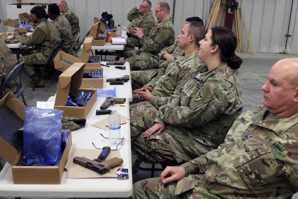 Fort Mccoy’s NEFF fields Fort Jackson’s SIG Sauer pistols
