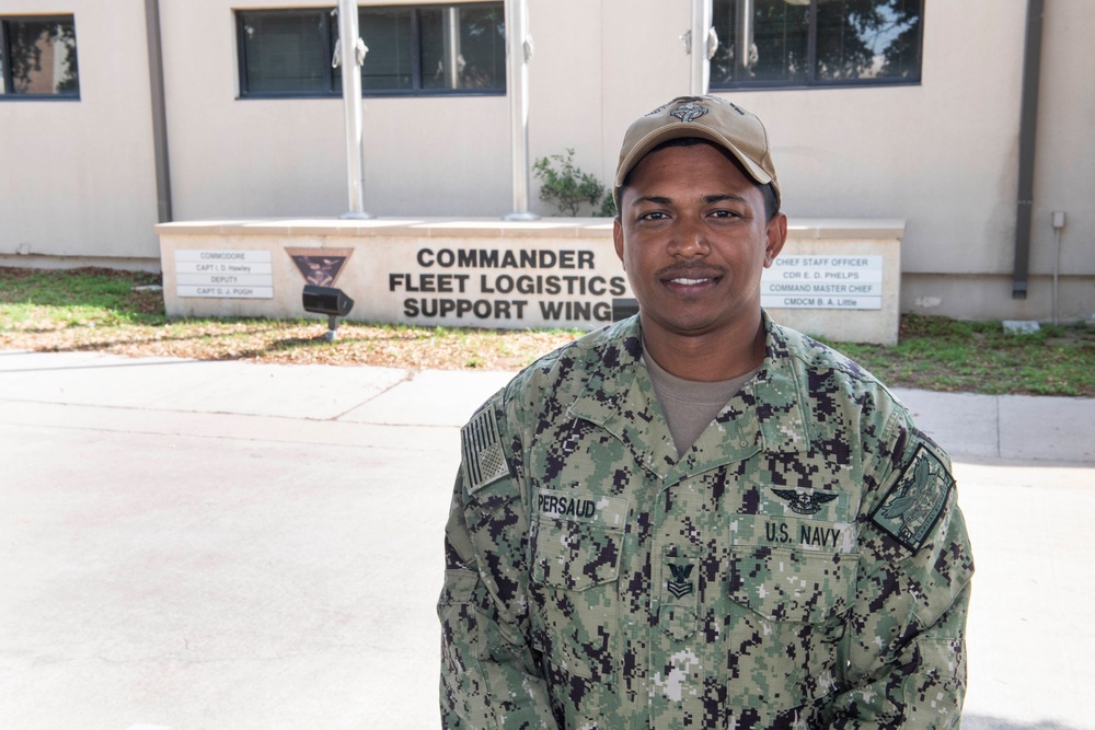 Aviation Maintenance Administrationman 1st Class Gavin Persaud Poses for a Portrait